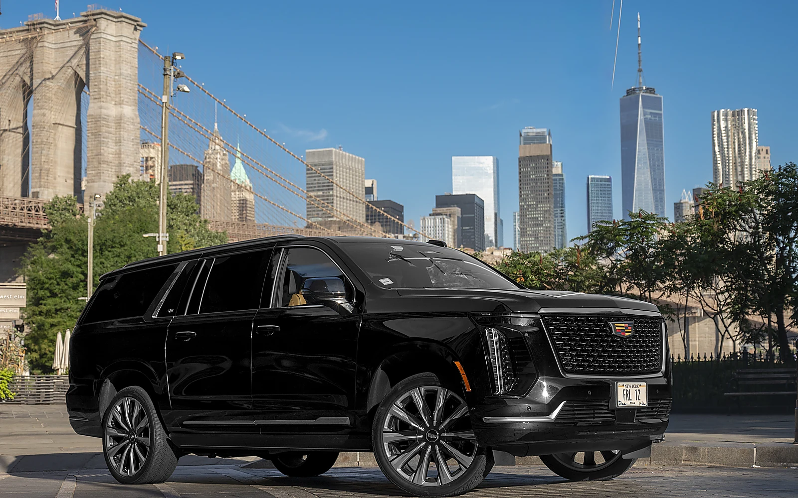 Cadillac Escalade ESV, side profile with Manhattan skyline