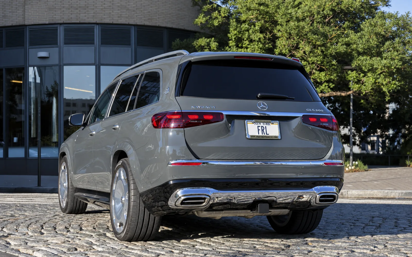 Mercedes-Maybach GLS 600, rear three-quarter with city backdrop