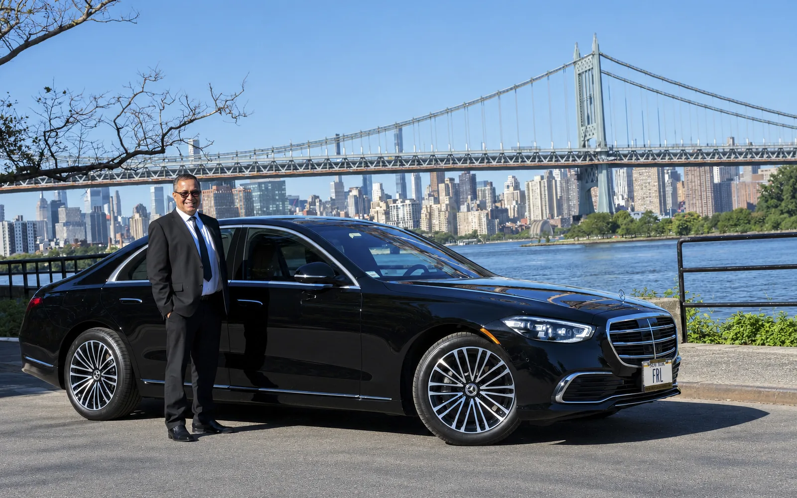 Friendly Ride chauffeur beside the Mercedes-Benz S 580 4MATIC